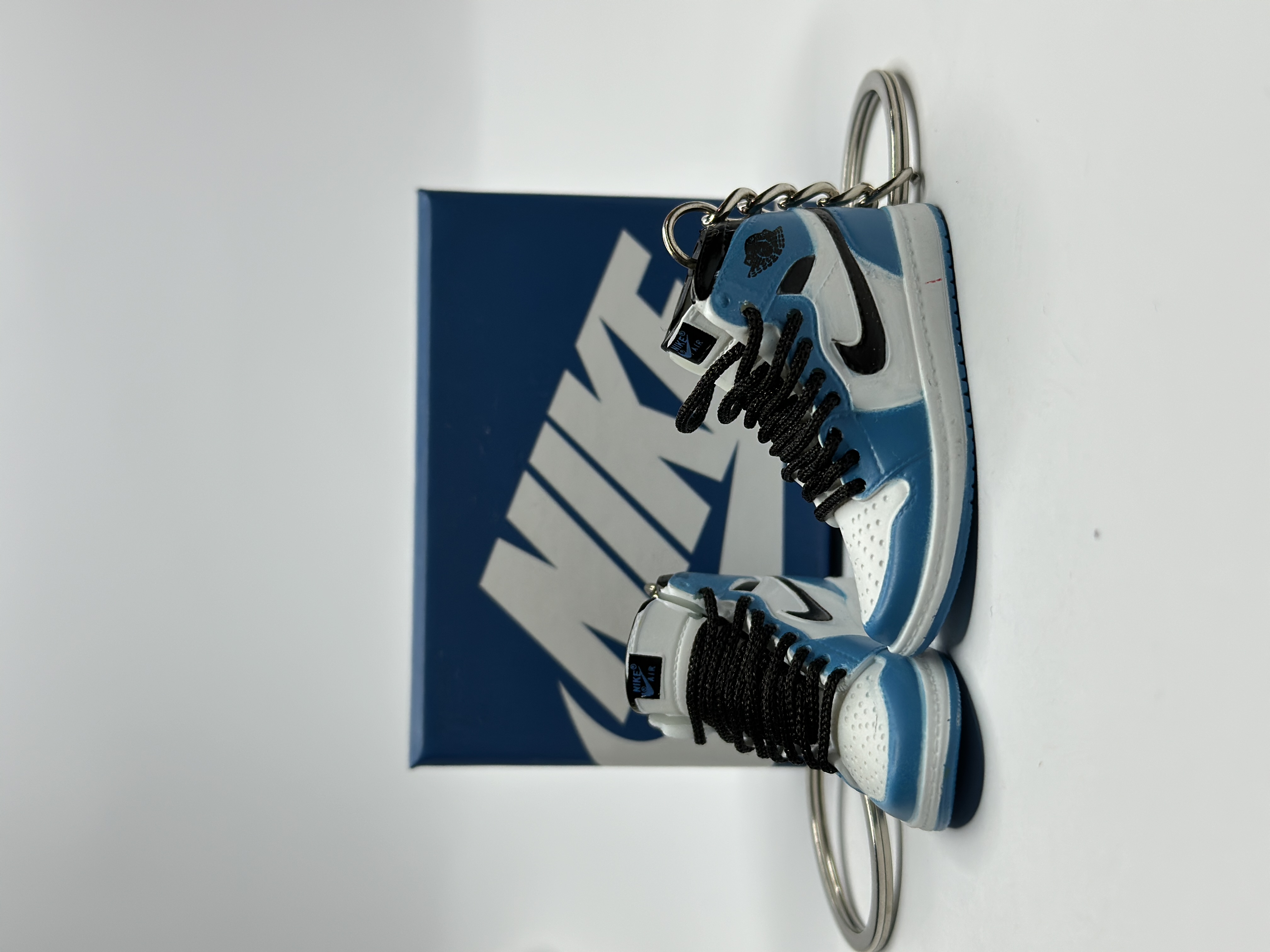 MiniSneakers pair in front of box - Detail View